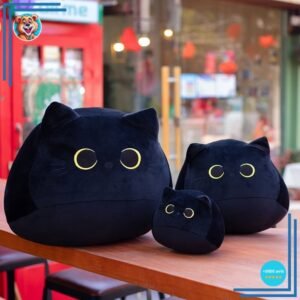Peluche chaton noir aux grands yeux