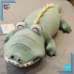 Peluche dinosaure bleu magique