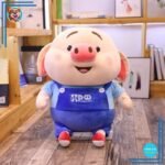 Peluche cochon habillé tenue bricoleur