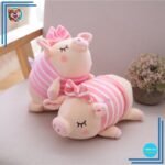 Peluche cochon avec petit nœud rose
