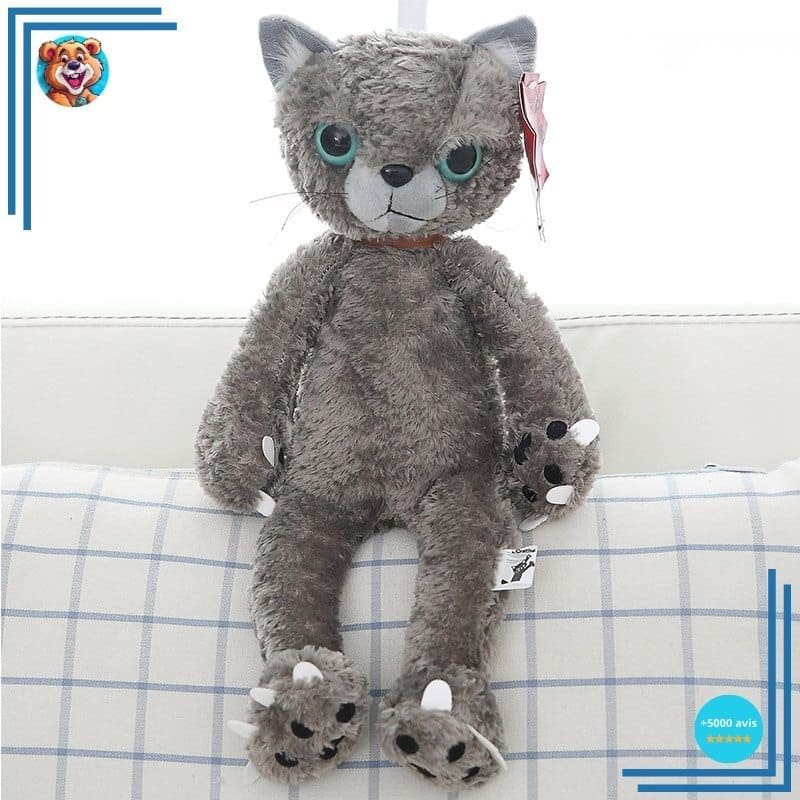 Peluche chat beige mécontent assis
