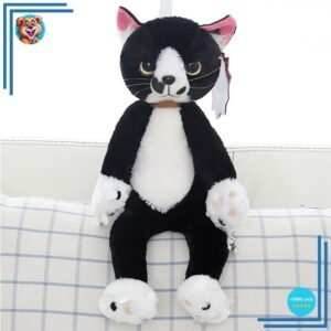 Peluche chat noir et blanc mécontent assis