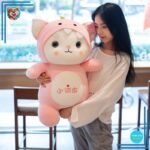 Peluche chat déguisé en dinosaure