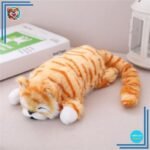 Peluche chat tigré orange endormie