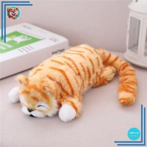 Peluche chat tigré orange endormie