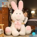 Peluche lapin blanc géant assis