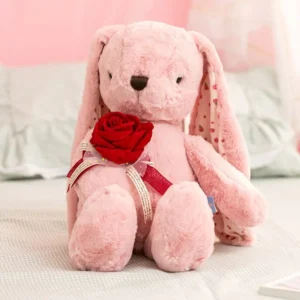 Peluche géante lapin avec une rose