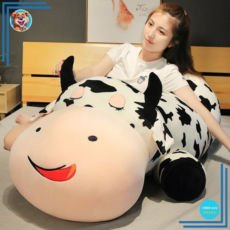 Peluche vache allongée
