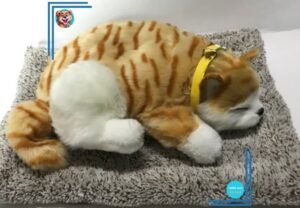 Peluche chat orange tigré endormi