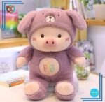 Peluche cochon déguisé en lapin