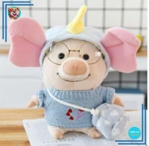 Peluche cochon habillé en éléphant