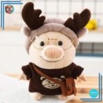 Peluche cochon habillé en renne
