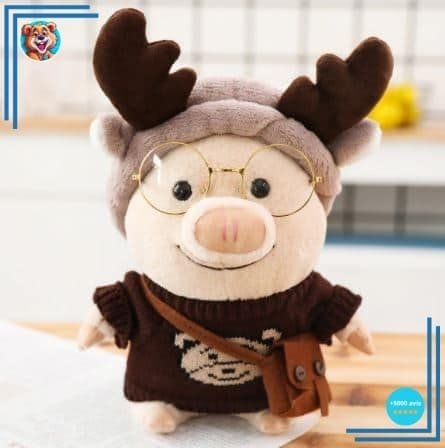 Peluche cochon habillé en renne