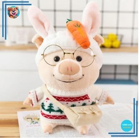 Peluche cochon habillé pull Noël