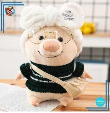 Peluche cochon habillé pull noir