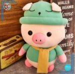 Peluche cochon habillé tenue verte