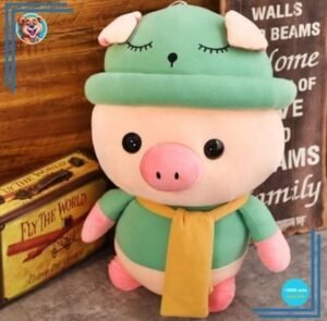 Peluche cochon habillé tenue verte