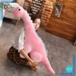 Peluche dinosaure rose