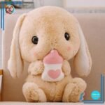 Peluche lapin avec biberon