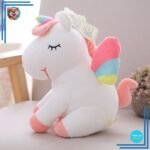 Peluche licorne blanche arc-en-ciel