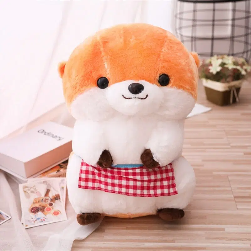 Peluche loutre en tablier