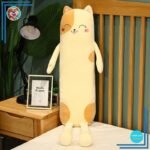 Peluche oreiller chat long