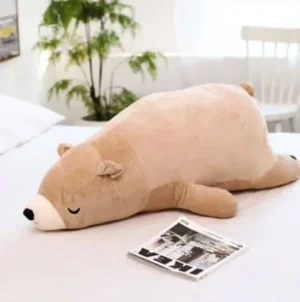 Peluche ours marron qui dort