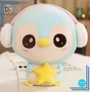 Peluche pingouin bleu clair avec cache oreilles