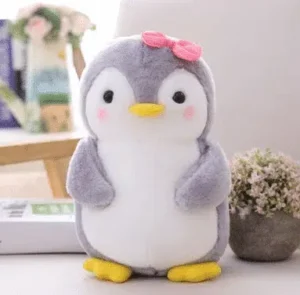 Peluche pingouin nœud rose