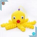 Peluche poulpe jaune douce tressée pour enfant