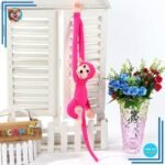Peluche singe kawaii longue queue fushia