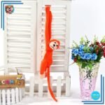Peluche singe kawaii longue queue orange