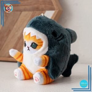 Poupée en peluche petit chat déguisé en requin