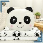 Peluche panda joyeux avec couverture