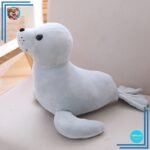 Otarie gris sympathique en animal en peluche