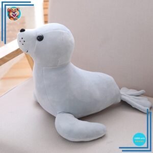 Otarie gris sympathique en animal en peluche