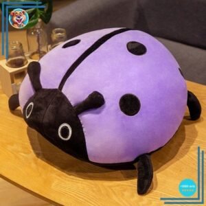 Peluche coussin mauve porte bonheur