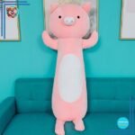Adorable coussin peluche en forme de cochon
