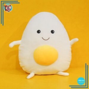 Peluche géante souriante en forme de crane d’œuf