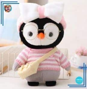 Peluche pingouin pull rose